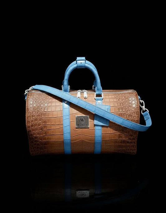 Braune Reisetasche aus Anaconda-Leder mit blauen Akzenten