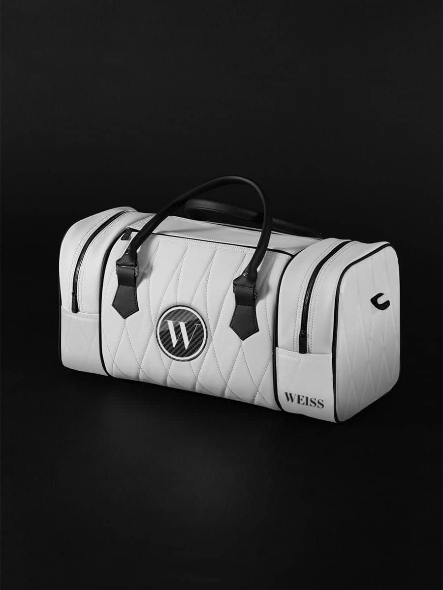 Weiße gesteppte Luxus-Handtasche mit schwarzen Akzenten